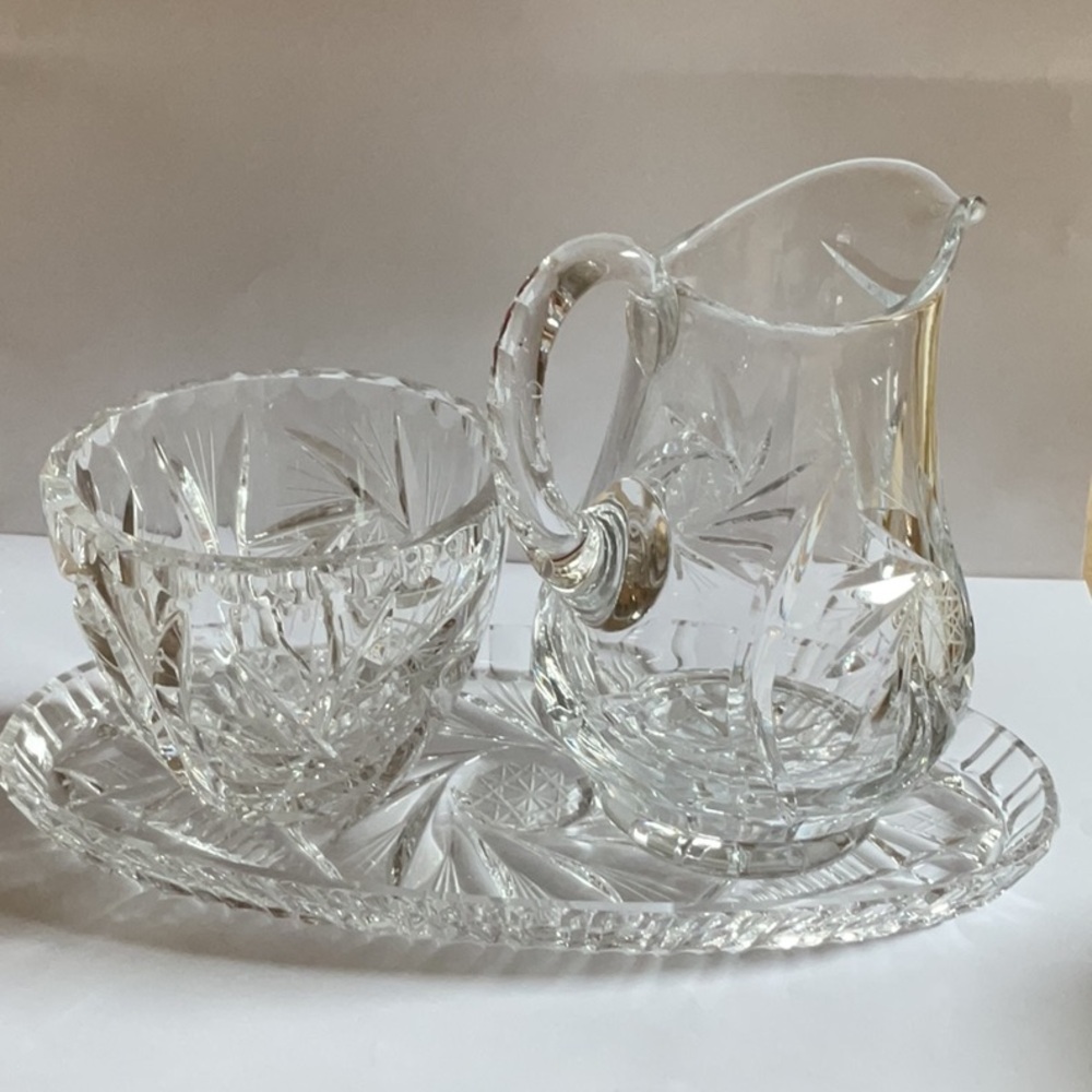 Elegant Crystal Cream and Uncovered sugar bowl.